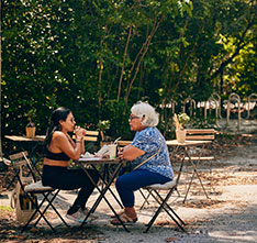 Women sitting together. Links to Gifts from Retirement Plans