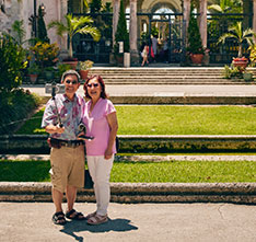 A couple posing for a photo. Links to Gifts That Protect Your Assets